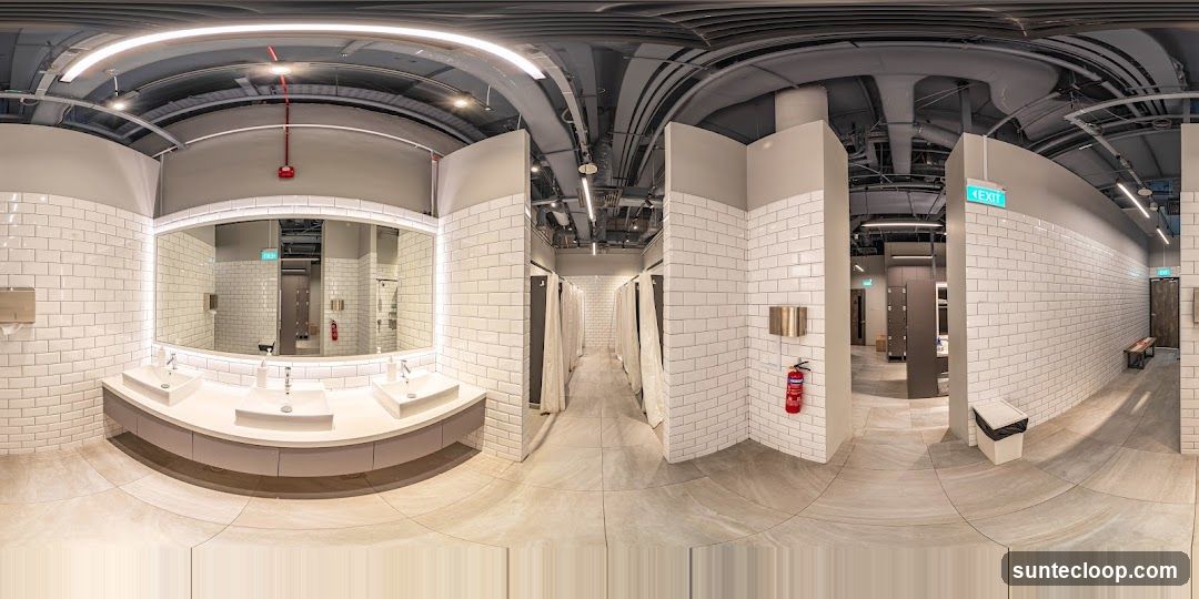 Modern Restroom with Sinks and Shower Stalls
