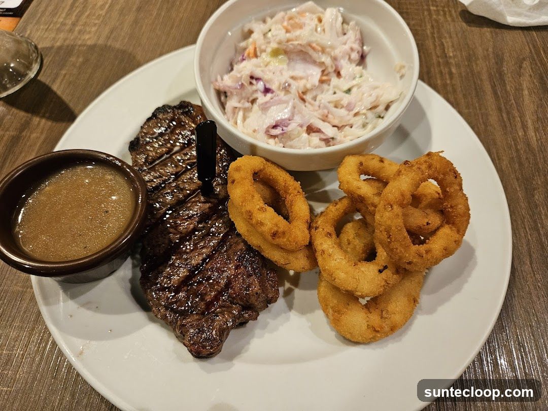 Steak Dinner with Onion Rings and Coleslaw