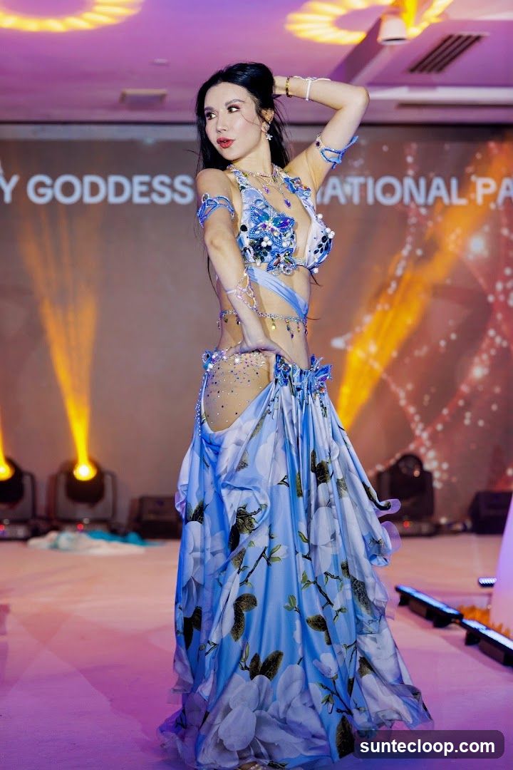Woman in Belly Dancing Costume on Stage