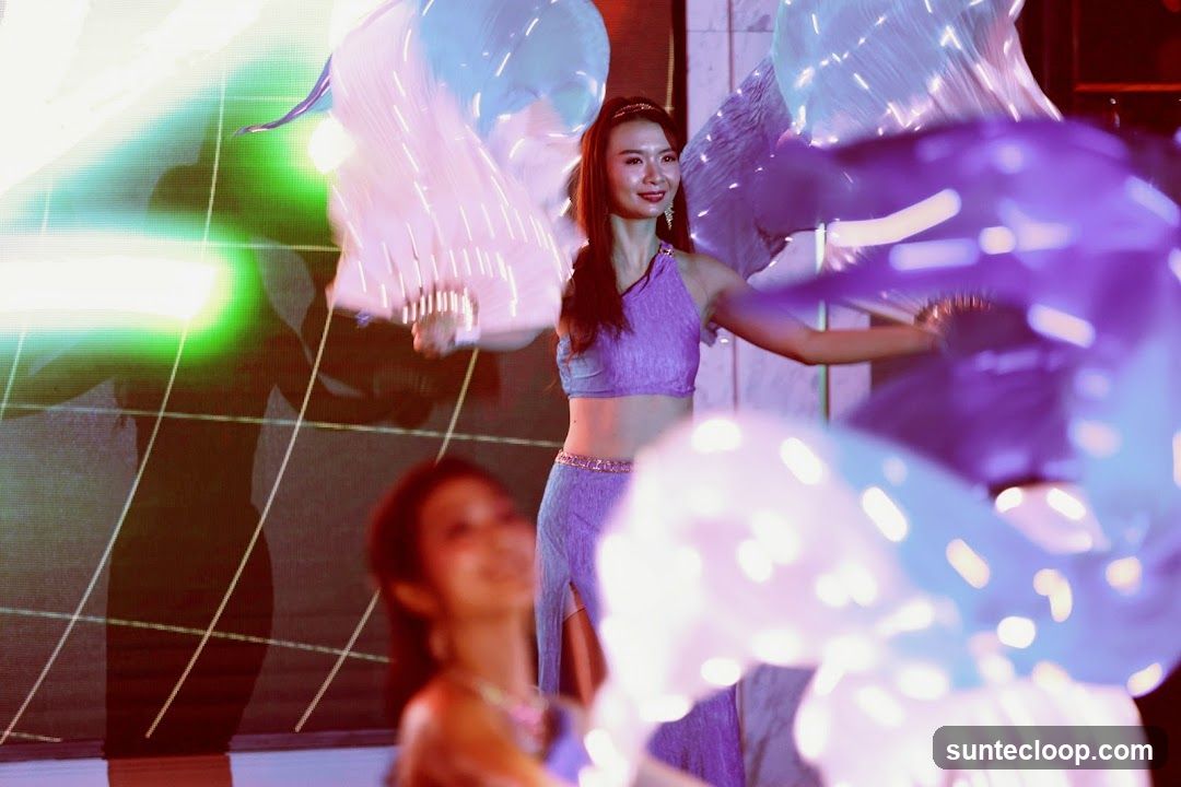Dancers with illuminated props