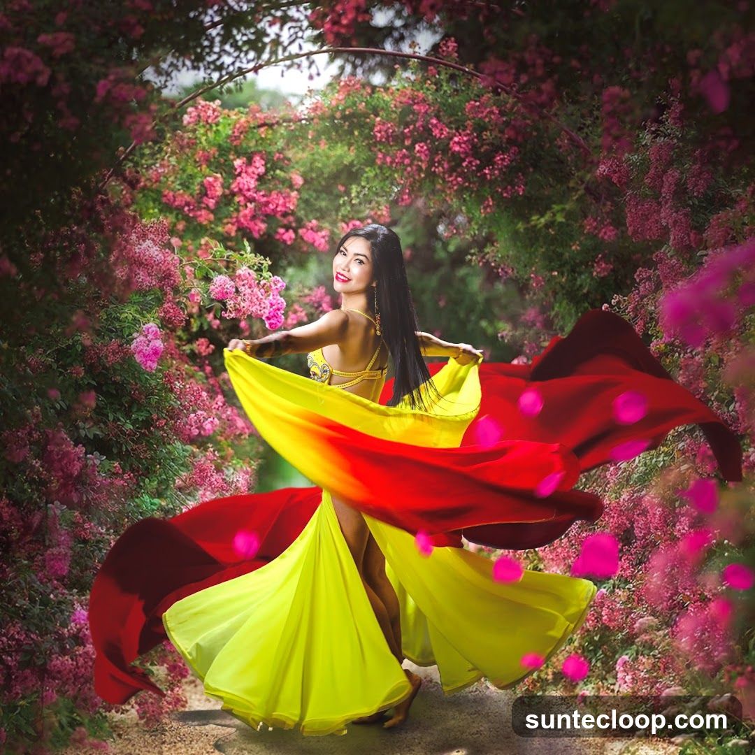 Woman in colorful costume dancing in a floral archway