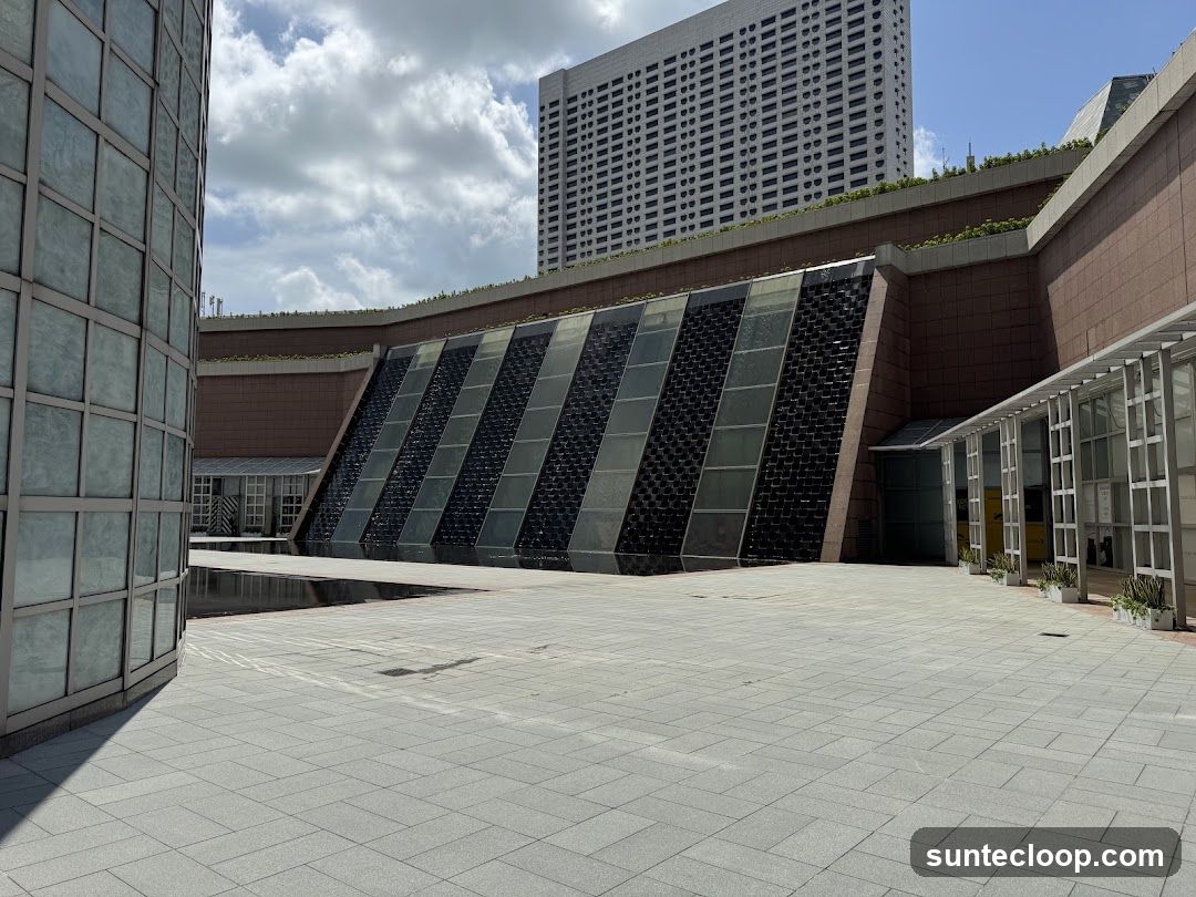 Modern Building Exterior with Water Feature