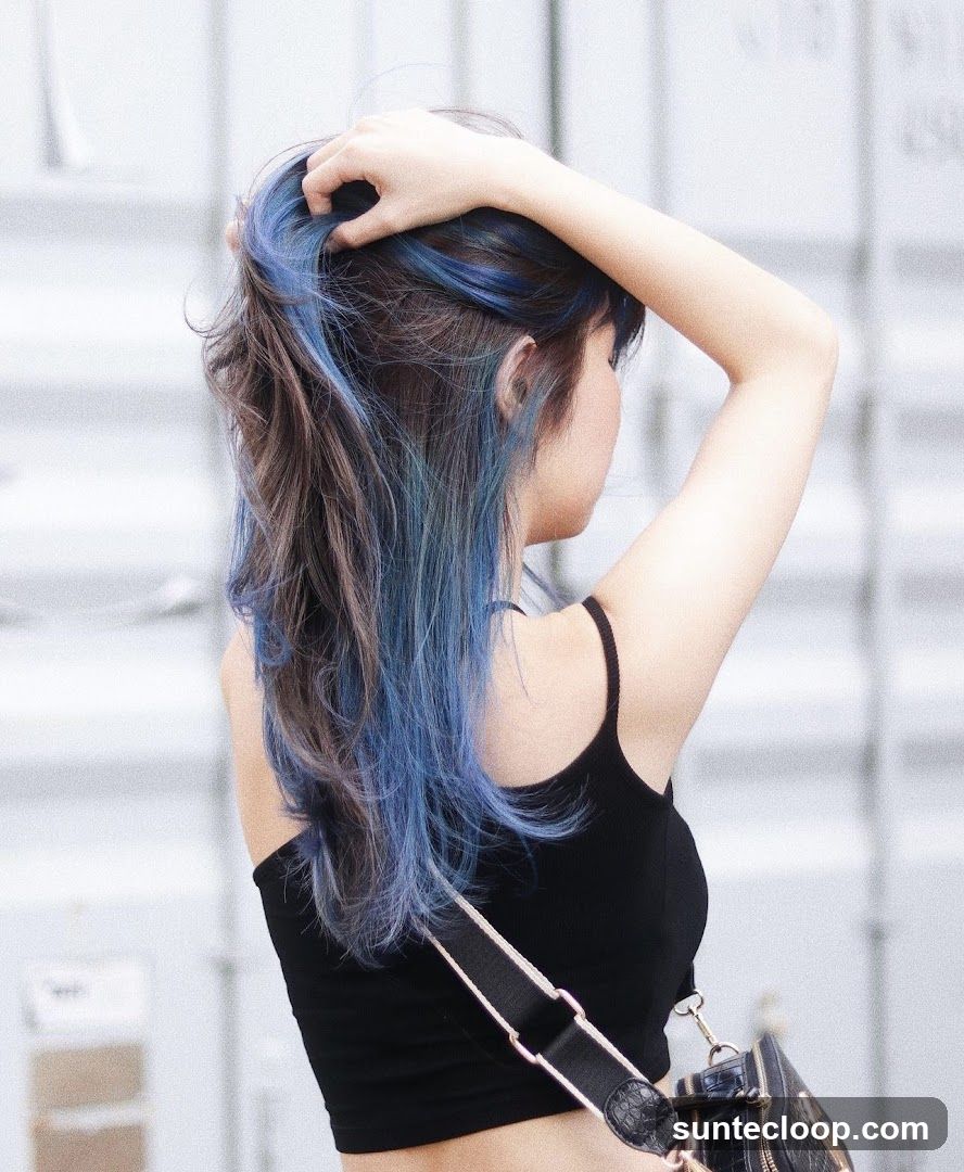 Woman with blue-streaked hair