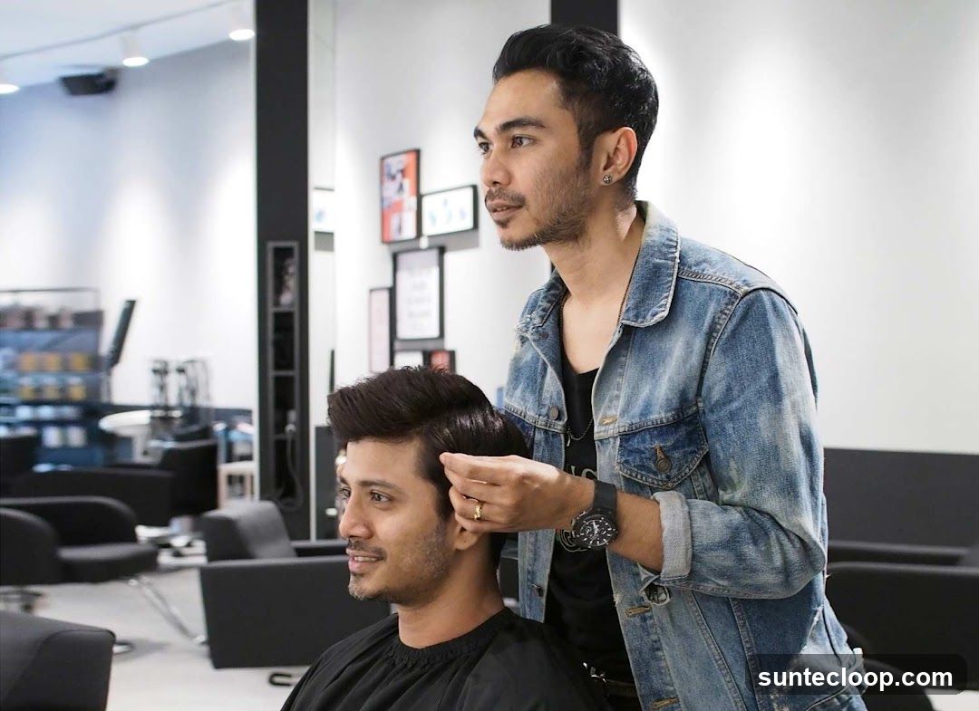 Hairdresser styling a client's hair