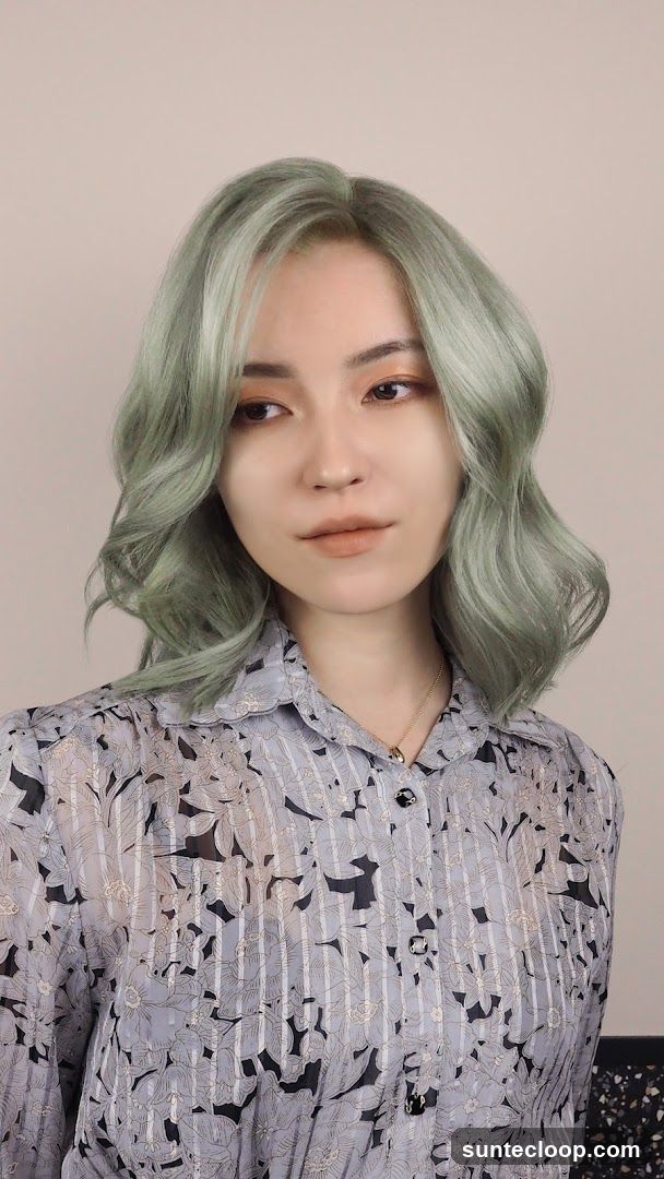 Woman with light green hair