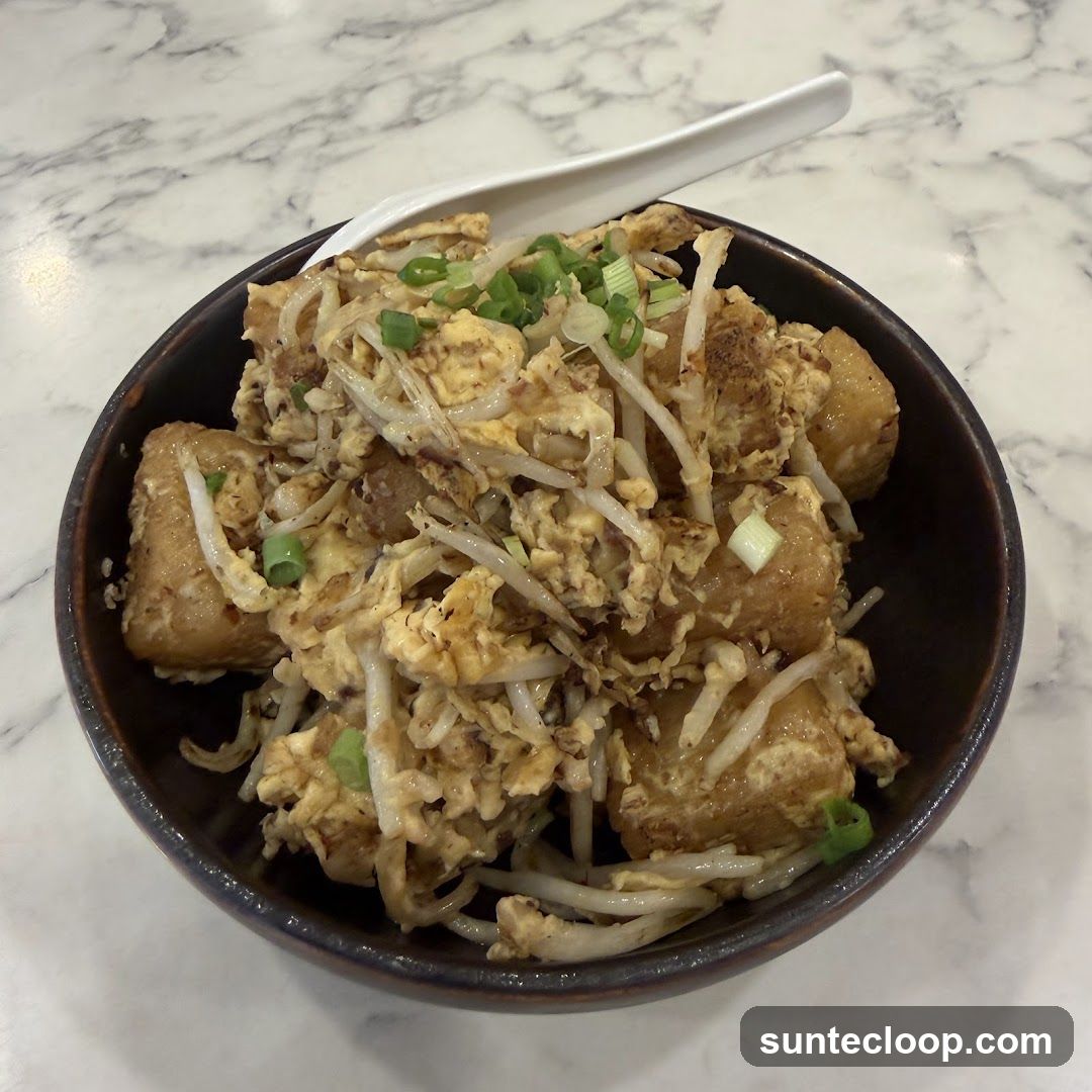 Fried Turnip Cake with Scrambled Eggs and Bean Sprouts