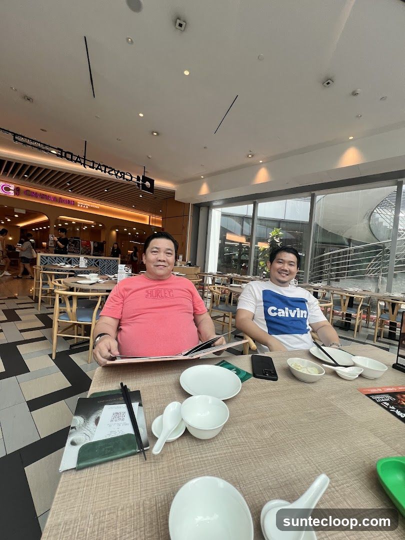 Two Men at a Restaurant Table
