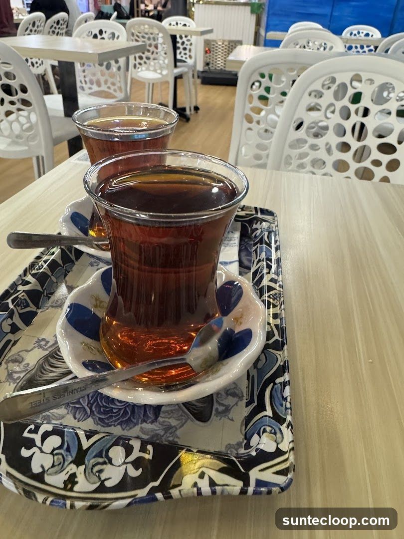 Two glasses of tea on a tray
