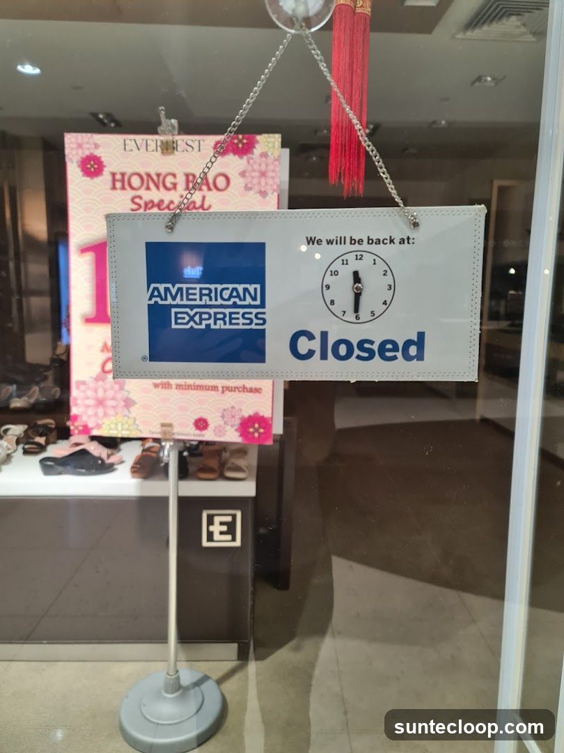 Closed Sign with American Express Logo