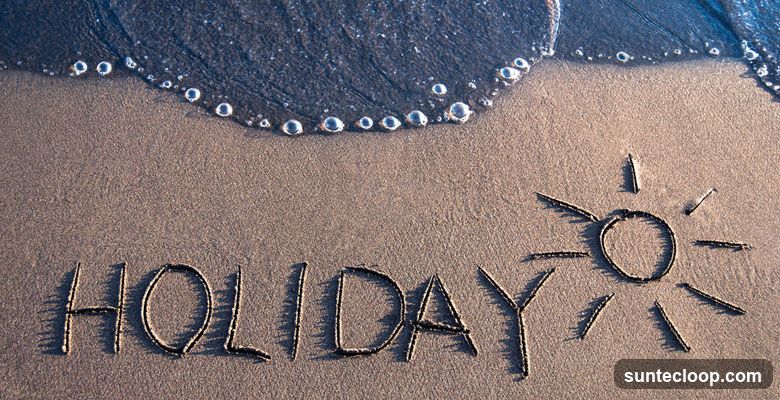 Holiday message written in sand