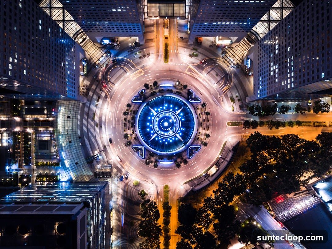 Aerial View of a City Roundabout at Night