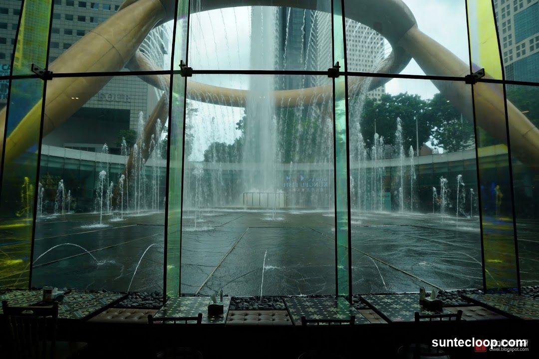 Indoor seating with view of a large fountain