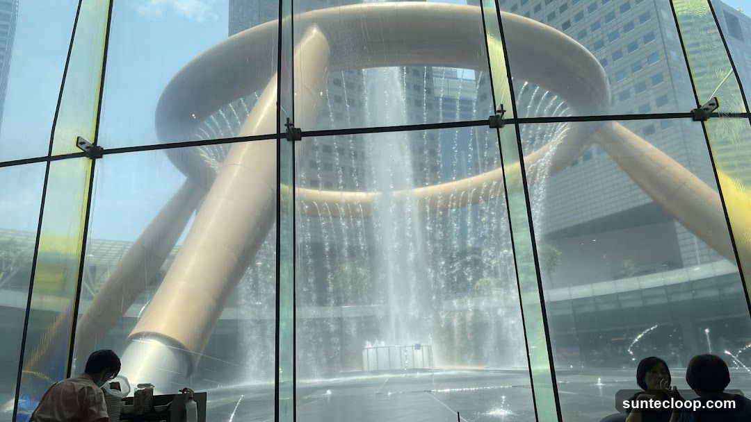 Fountain viewed through glass