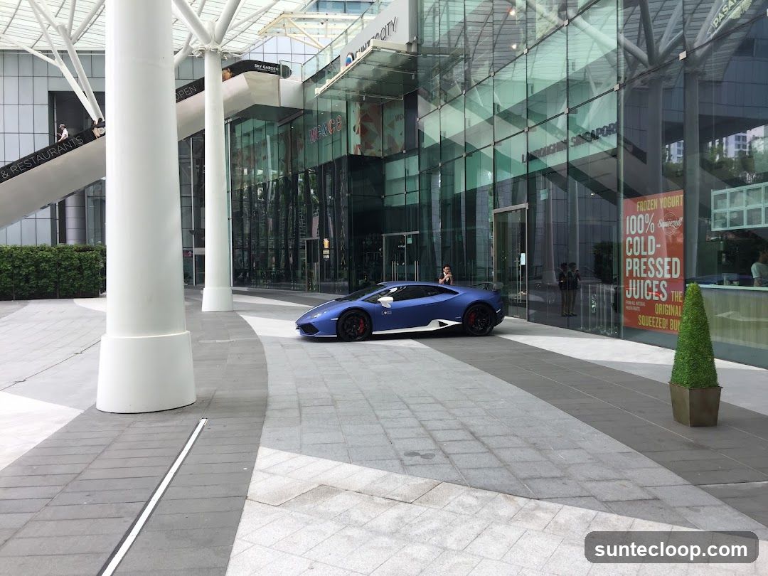 Blue Sports Car Outside Building