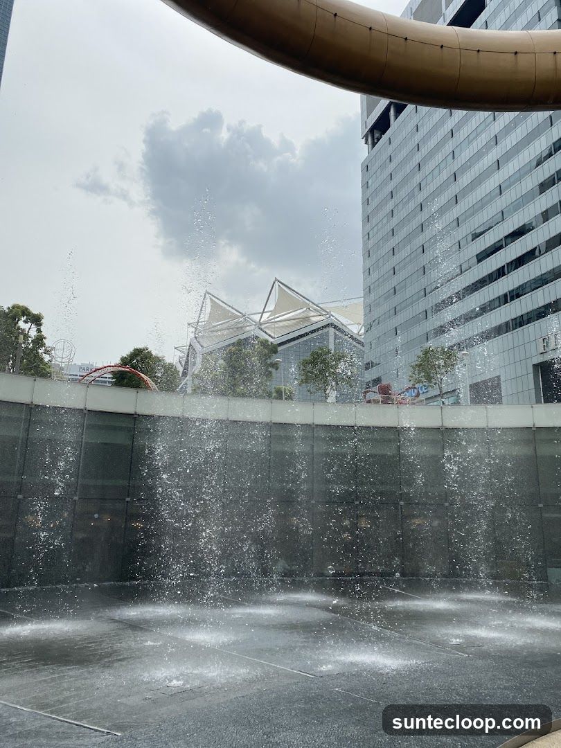 Fountain in front of modern buildings