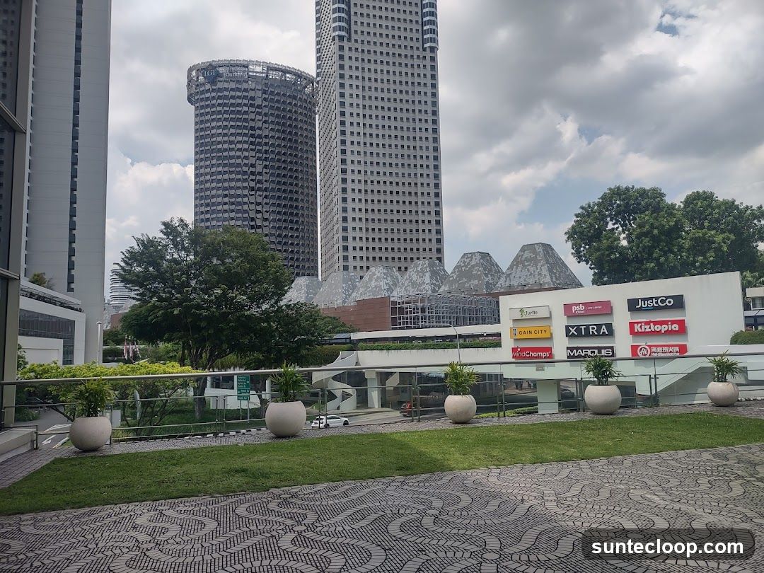 Outdoor plaza with buildings and signs
