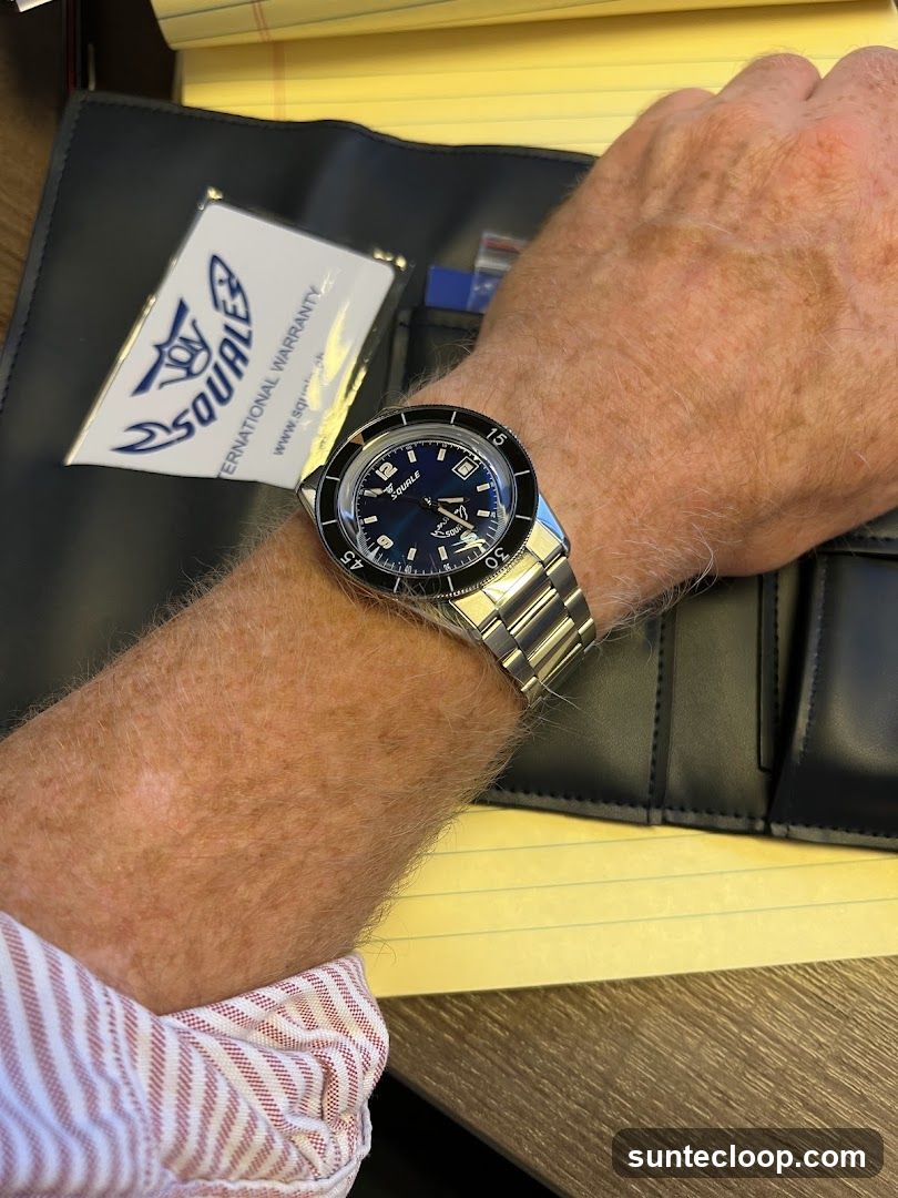 Watch on wrist with warranty card