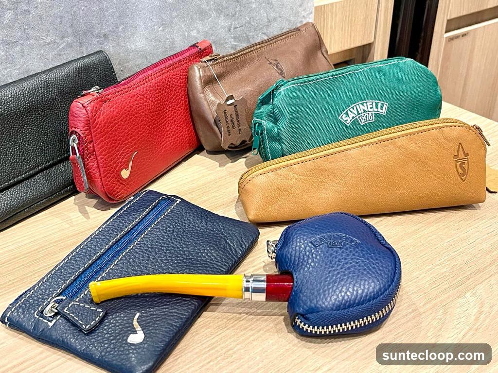 Assorted Pouches and Pipe Accessory