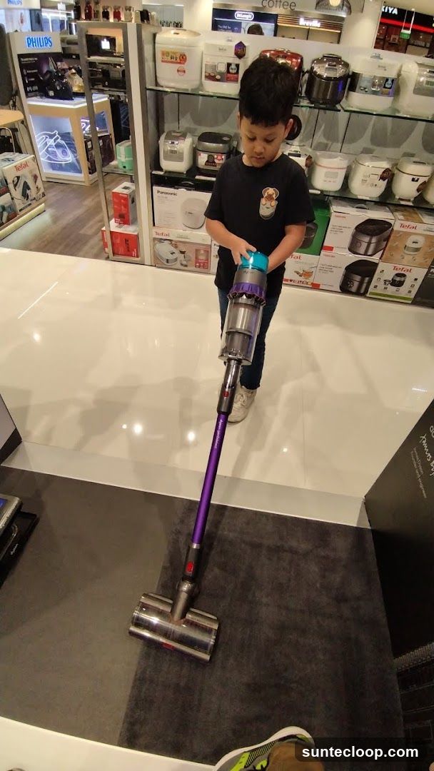 Boy with Vacuum Cleaner