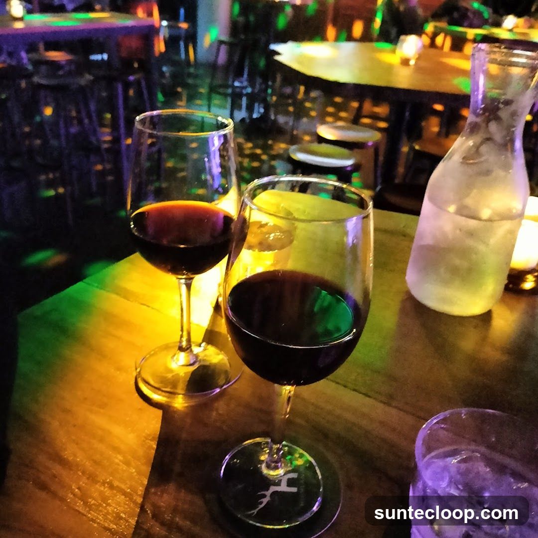 Two glasses of red wine on a table