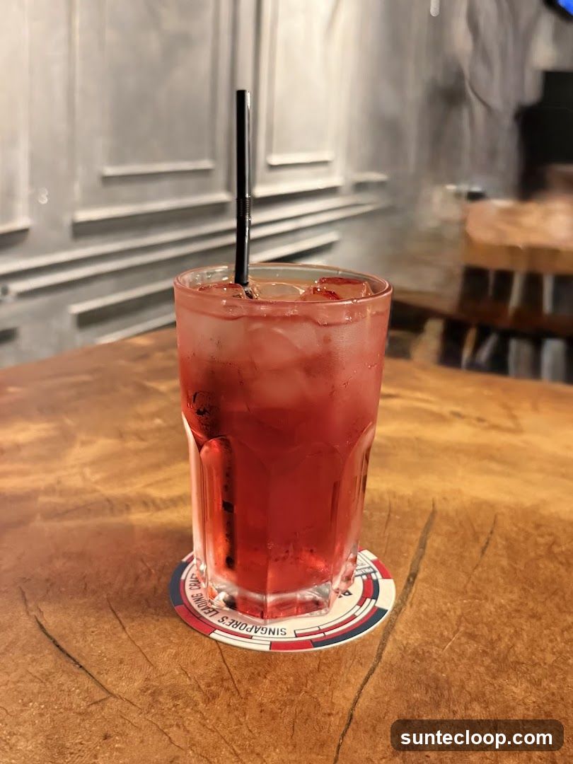 Red Drink with Ice and Straw