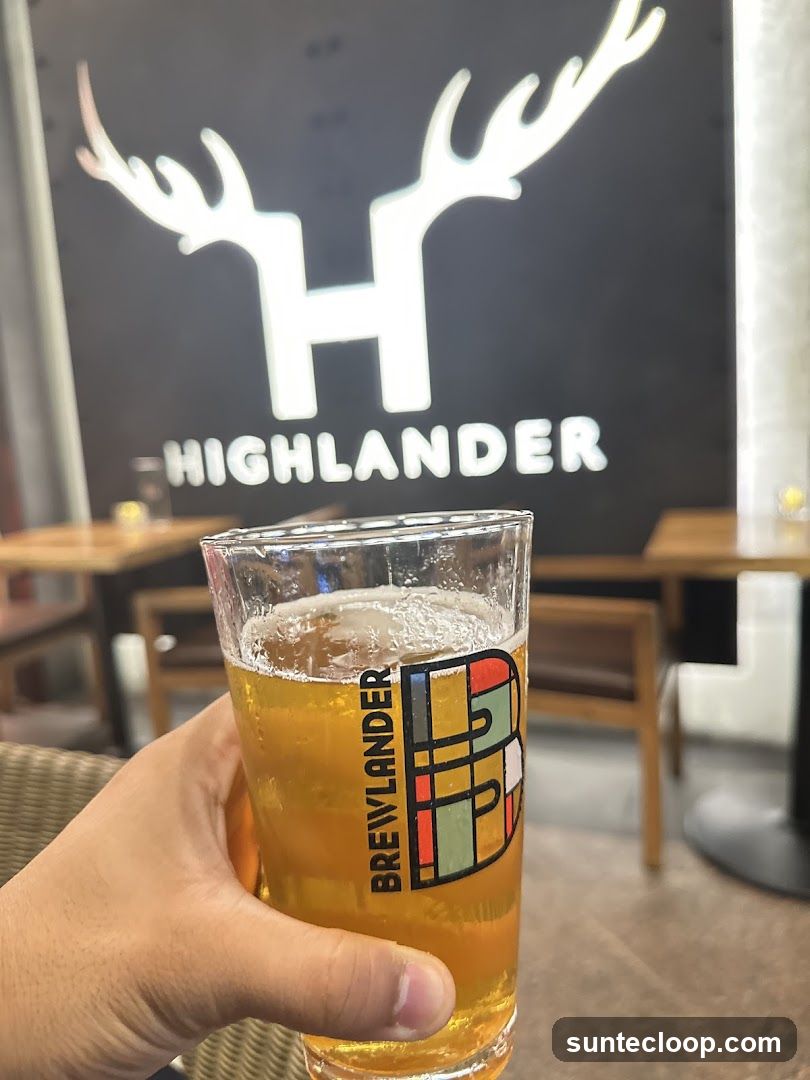 Beer in a glass with a logo