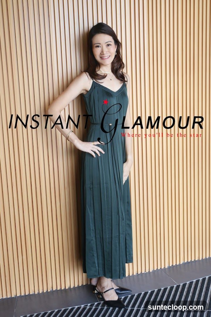 Woman Posing in a Green Dress
