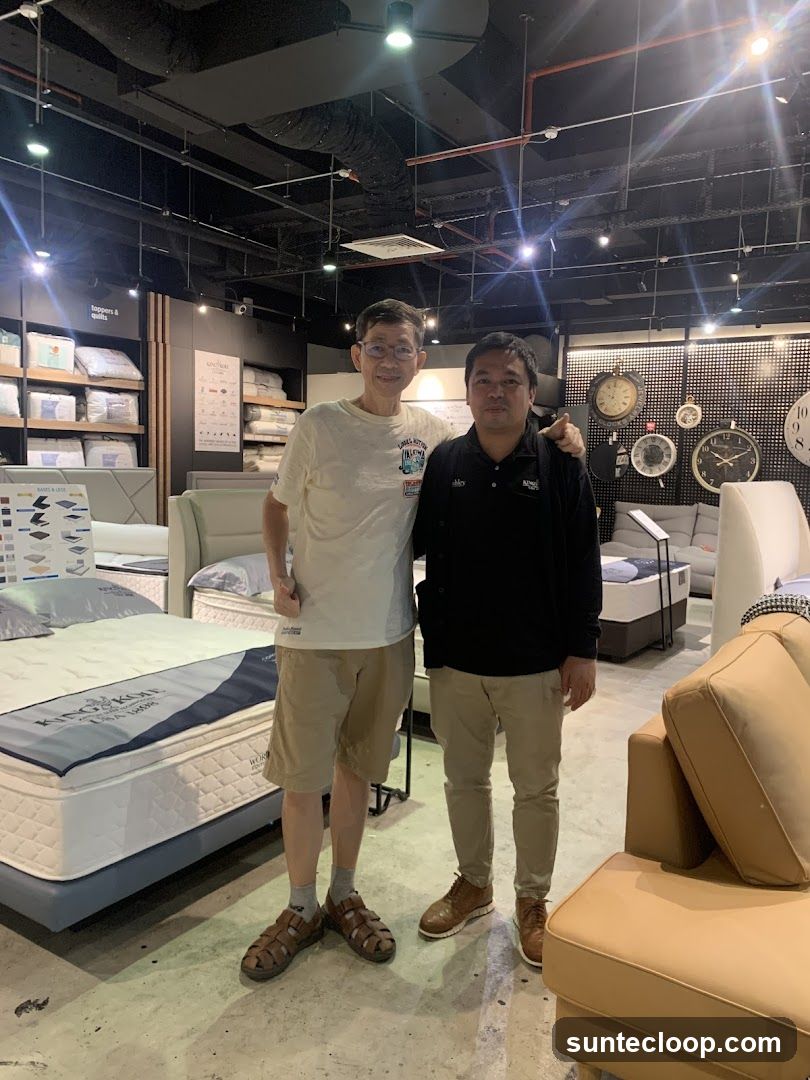 Two men in a mattress store
