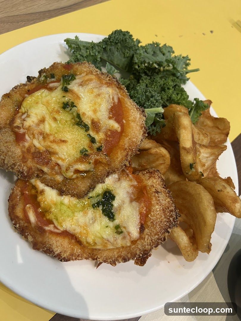 Chicken Parmigiana with Fries and Kale