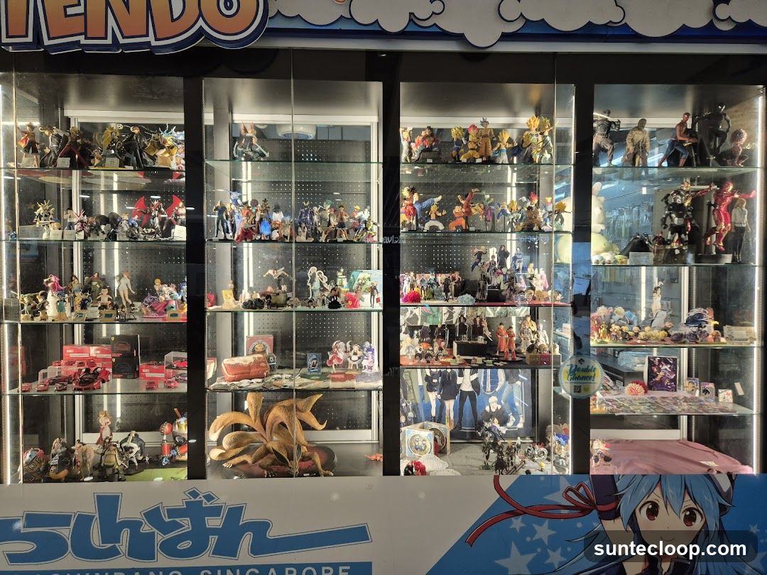 Display cases filled with anime figurines and merchandise