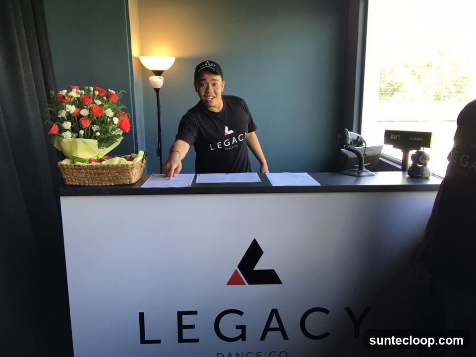 Reception Desk with Flowers and Staff