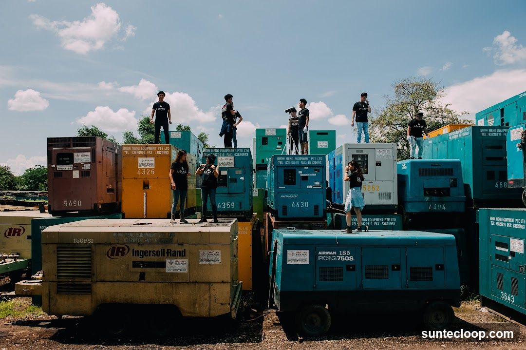 People Posing on Generators
