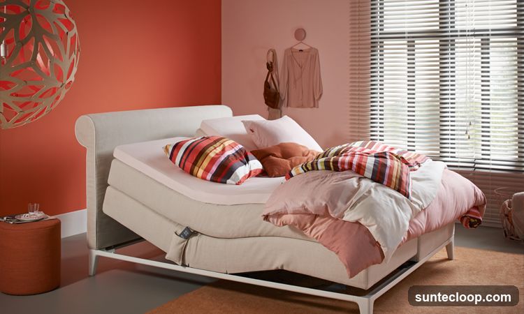 Adjustable Bed with Striped Pillows