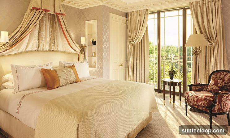 Luxurious Bedroom with Balcony View