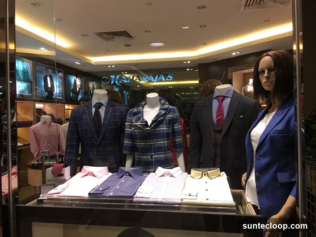 Mannequins in a clothing store window display