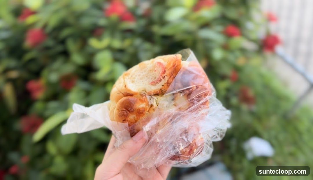Hand holding a pastry