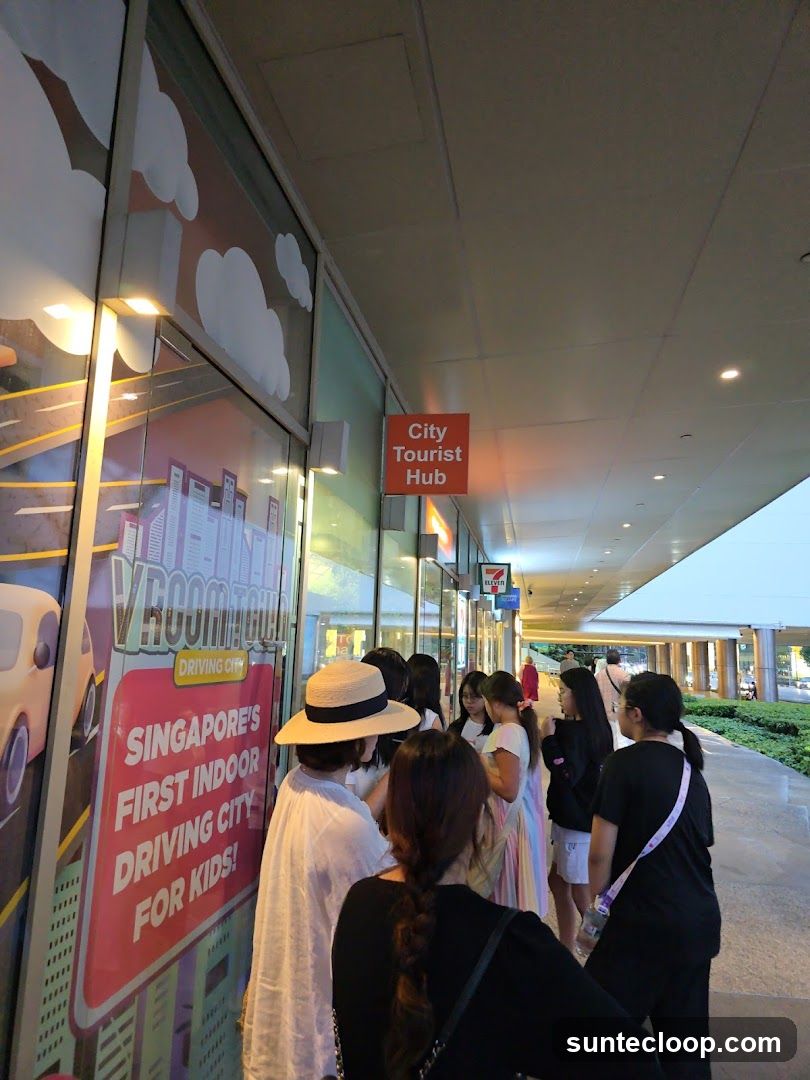 People waiting outside a tourist hub