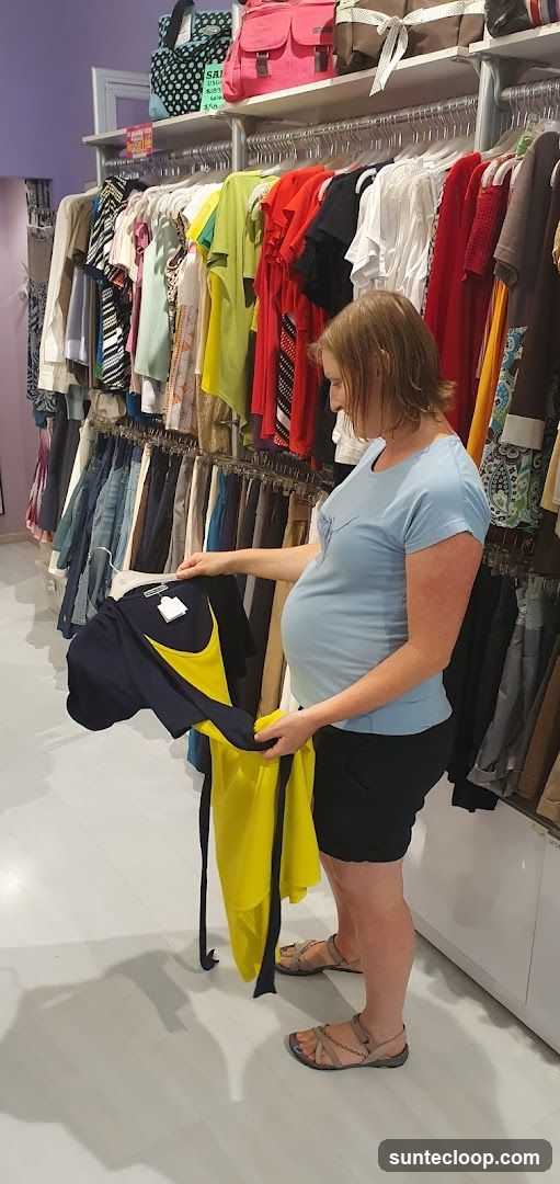 Woman browsing clothes rack