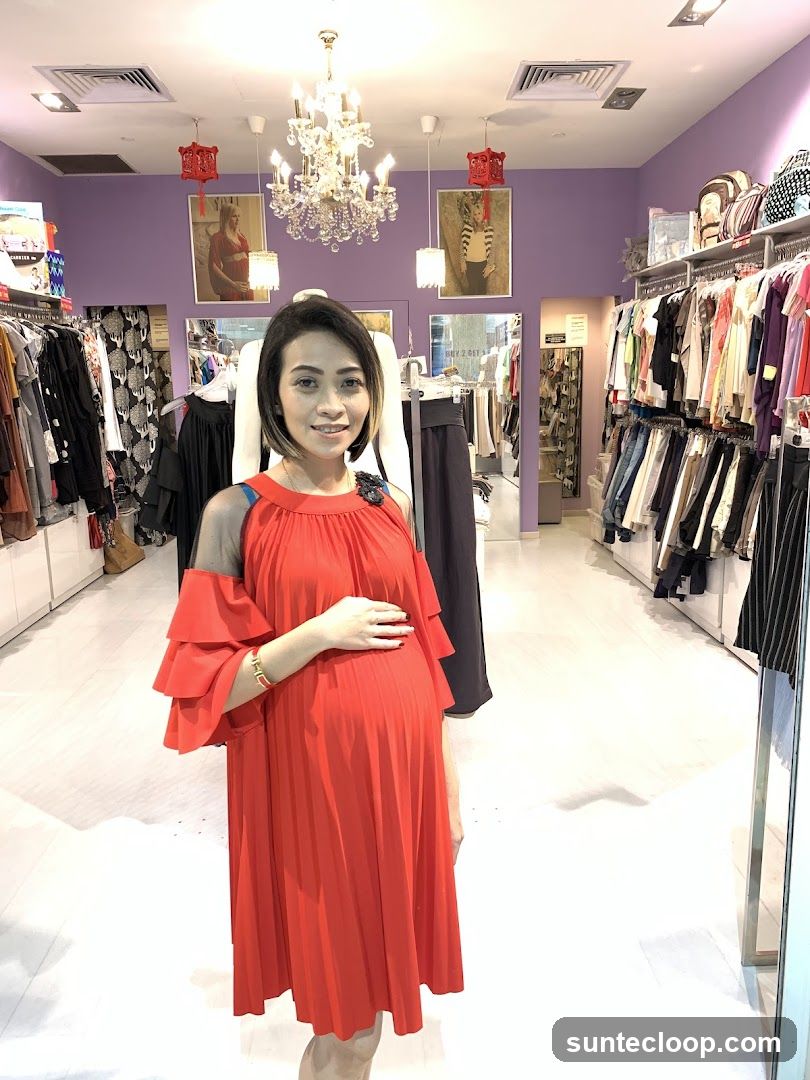 Woman in Red Dress in Clothing Store
