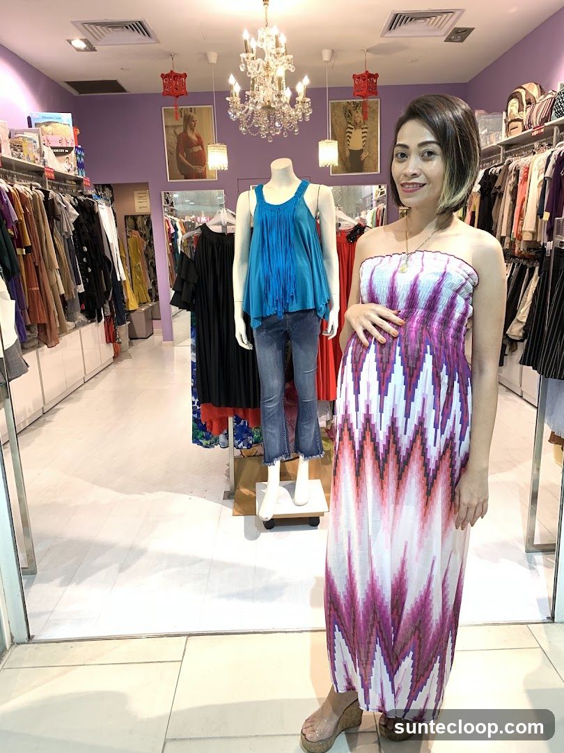 Woman in a dress in a clothing store