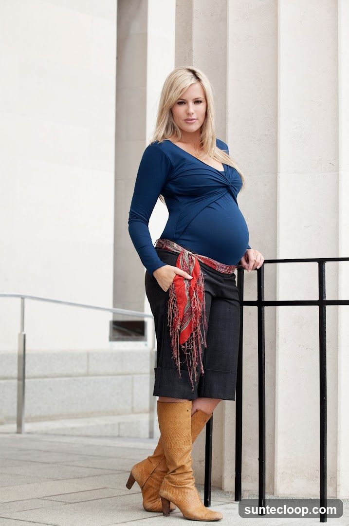 Pregnant woman posing outdoors