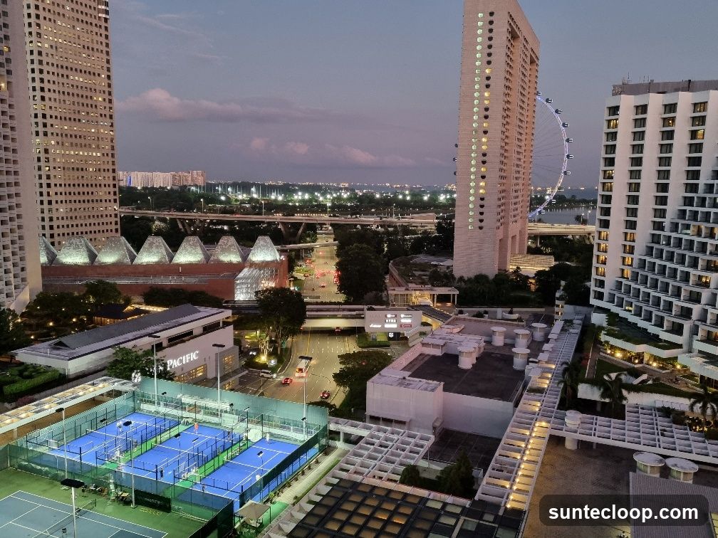 Cityscape at Dusk with Sports Courts