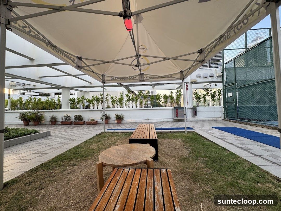 Outdoor Seating Area with Tennis Court View