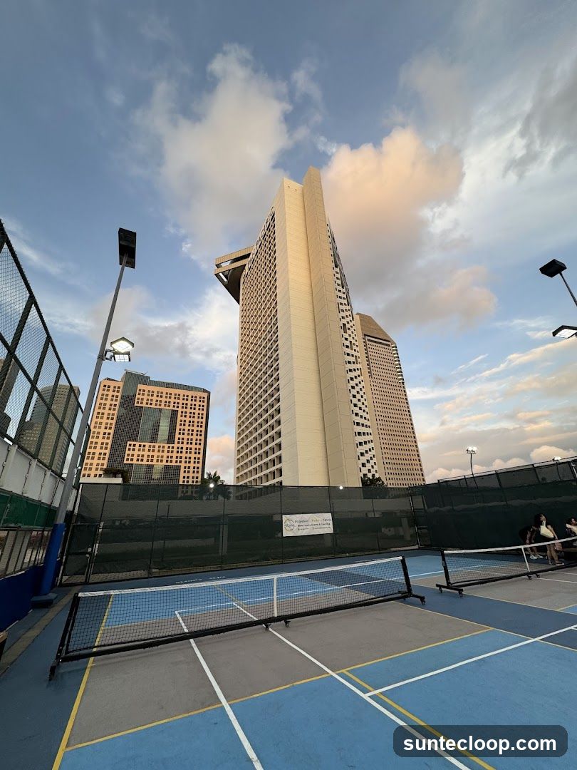 Tennis Courts with City Skyline