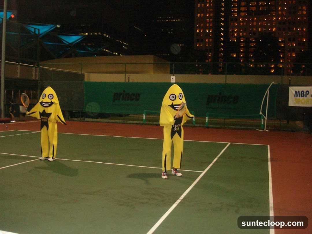 Mascots on Tennis Court