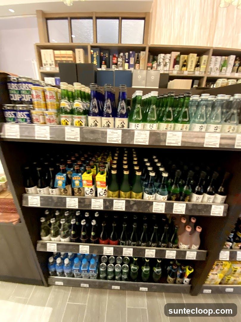Bottles of Sake and Other Beverages on Shelves