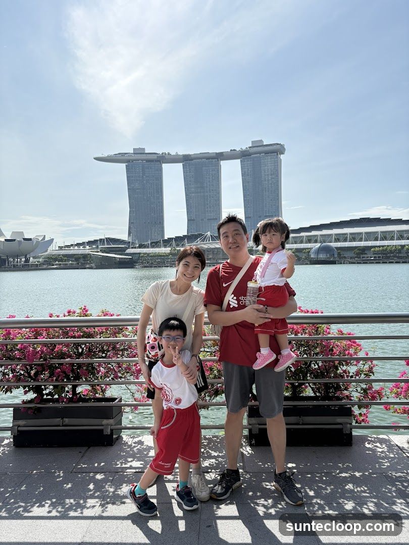 Family Posing with Marina Bay Sands in Background