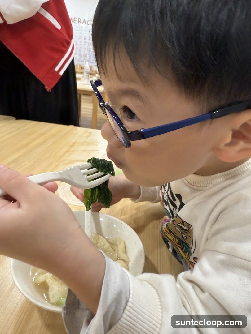 Child eating dumplings