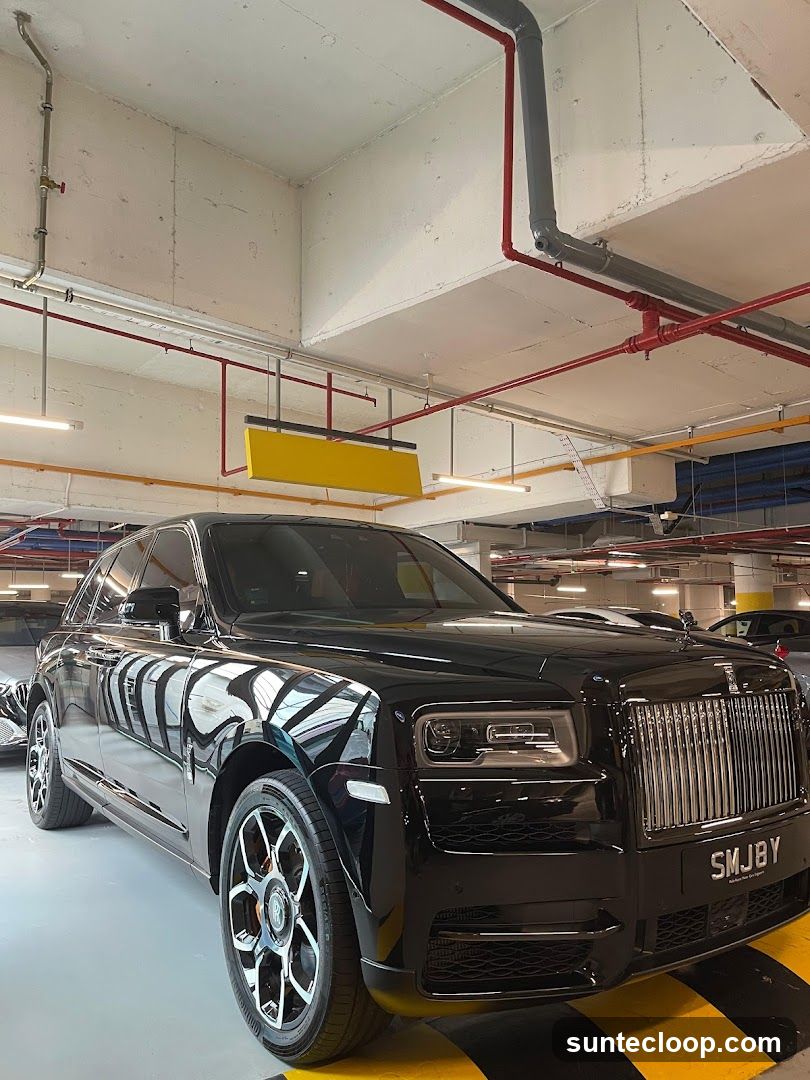Black Rolls-Royce Cullinan in Parking Garage