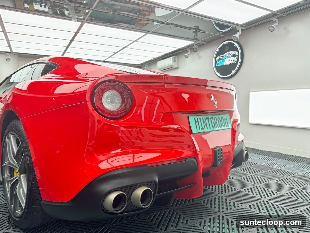 Red Ferrari in a Car Wash
